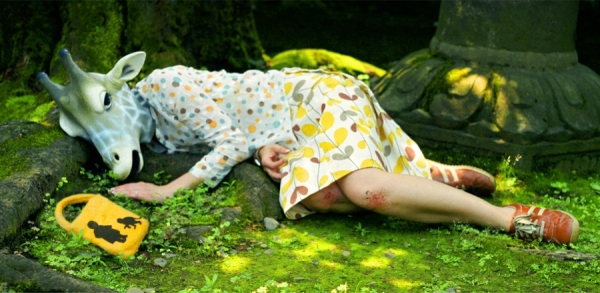 Photograph Todd Baxter Sleeping Giraffe Girl on One Eyeland